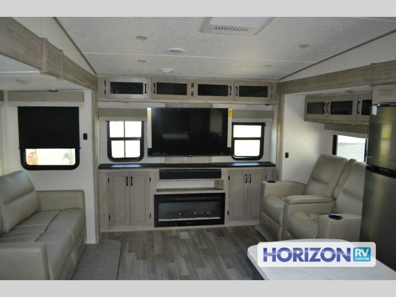 Coachmen RV Chaparral Lite 30BHS fifth wheel front living room with seating and an entertainment center